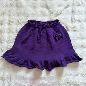 Y2K hand-knit whimsy fairy skirt with ruffles and flower detailing